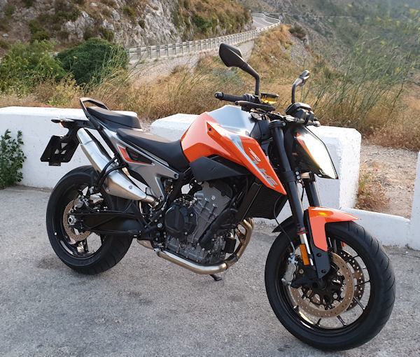 KTM 790 Duke with mountain roads in the background